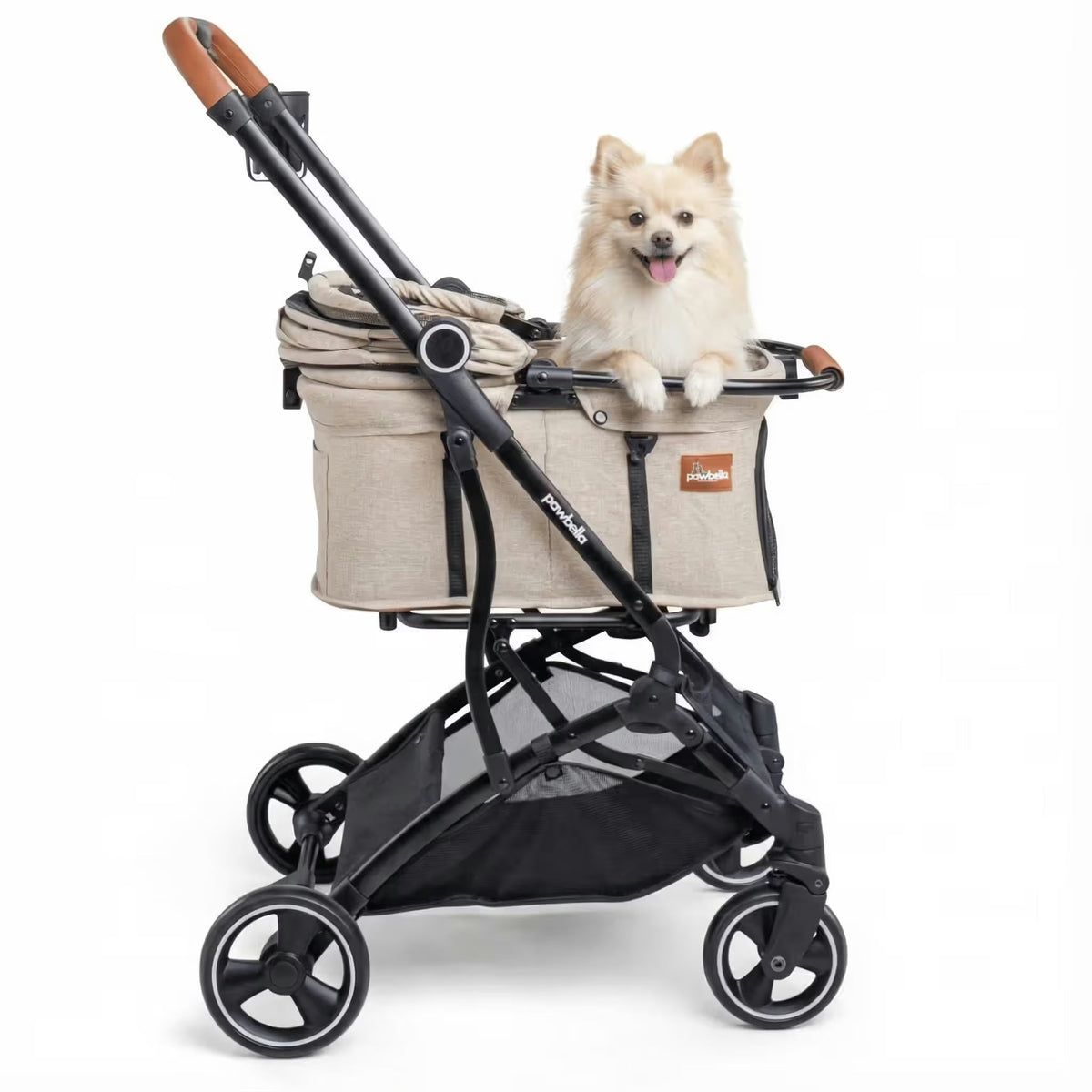 A small, fluffy dog sits happily in the Pawbella Essential Pet Stroller for small dogs and cats (up to 20kg), featuring black wheels and brown handle accents, ready for adventures in Australia.