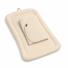 Beige Pawbella pet stroller plush cushion set and quilted front cover, angled product view